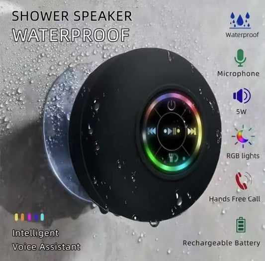 Woman listening to music with Bluetooth shower speaker mounted on bathroom wall - BibangS