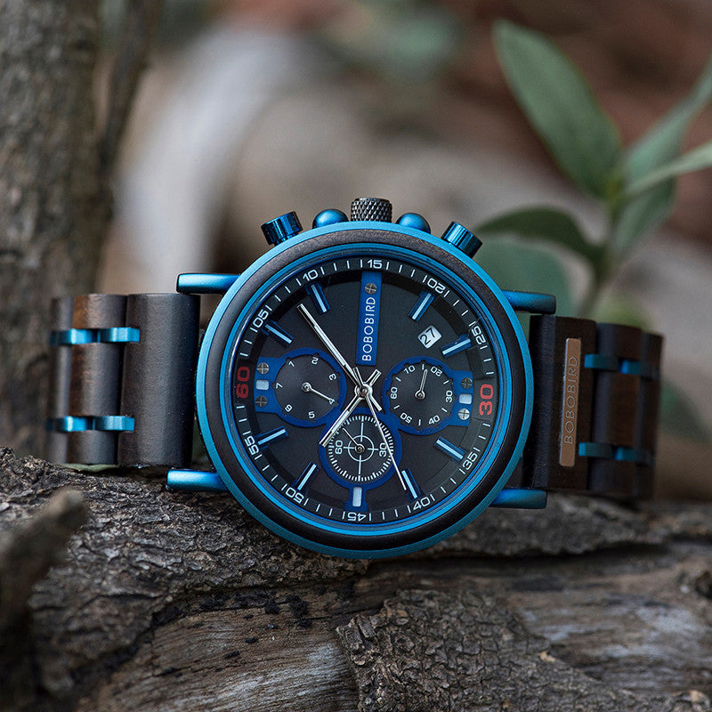 Men's luxury wooden watch quartz movement blue chronograph side view.
