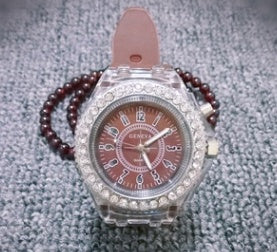 Geneva Watch Purple Silicone Strap Women Quartz Glow Dark Dial.
