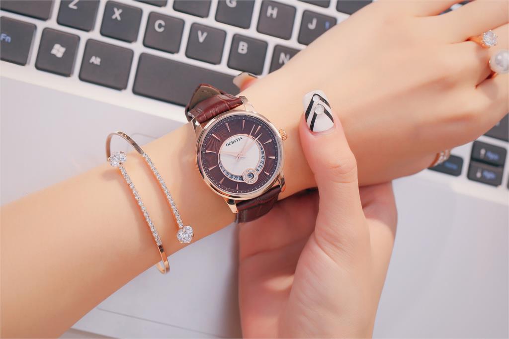 OCHSTIN Silver Black Ladies Quartz Watch – Leather Strap Calendar Waterproof Design.

