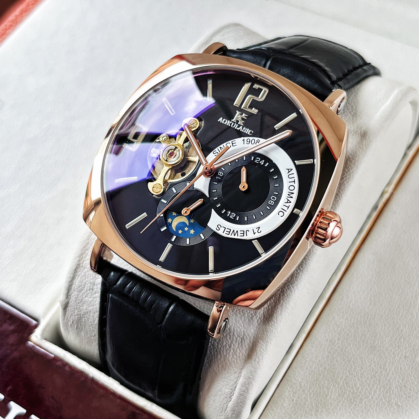 Black genuine leather strap buckle mens automatic mechanical wristwatch detail.

