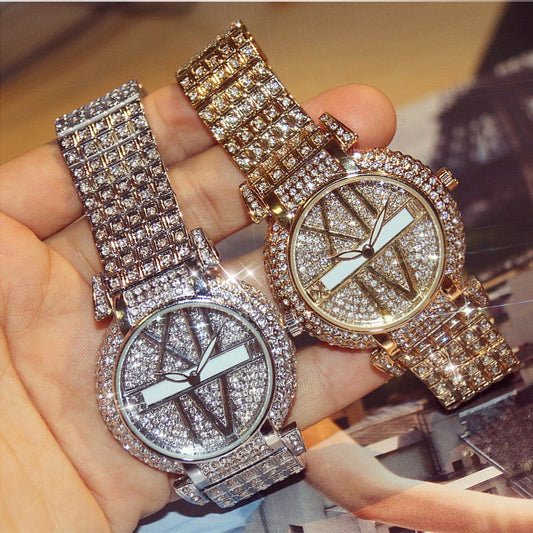 Women luxury crystal bracelet watch gold quartz movement water resistant elegant fashion watch.
