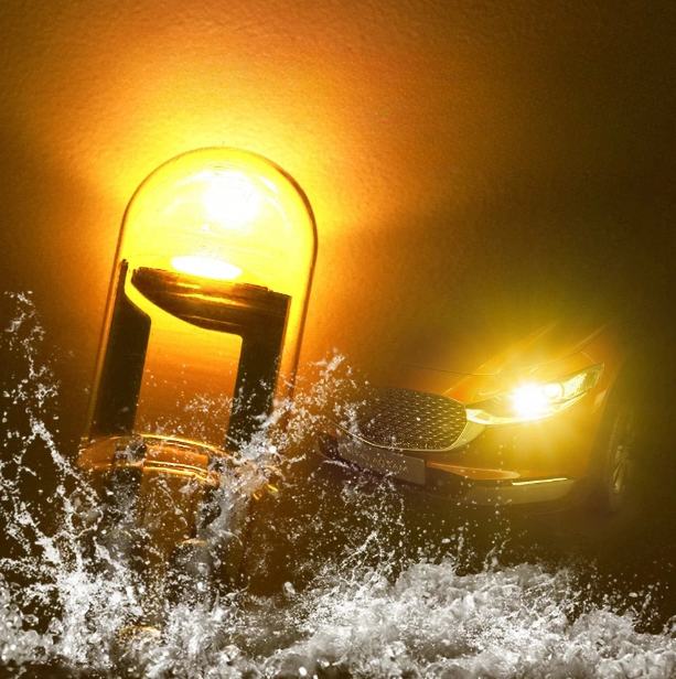 T10 LED yellow warm light bulb close-up.