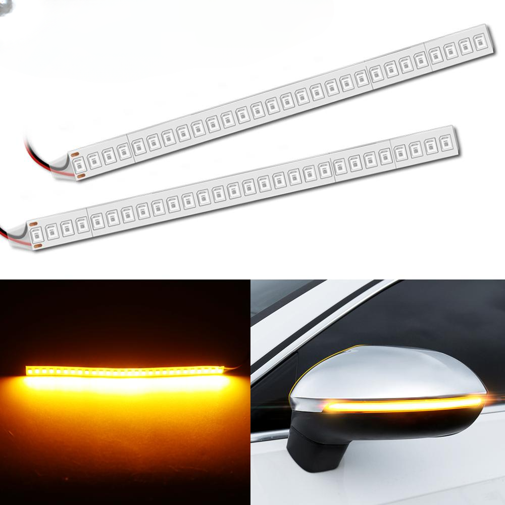Set of 2 dynamic amber LED turn signal strips for car rearview mirrors – flexible 15cm flowing indicator light.
