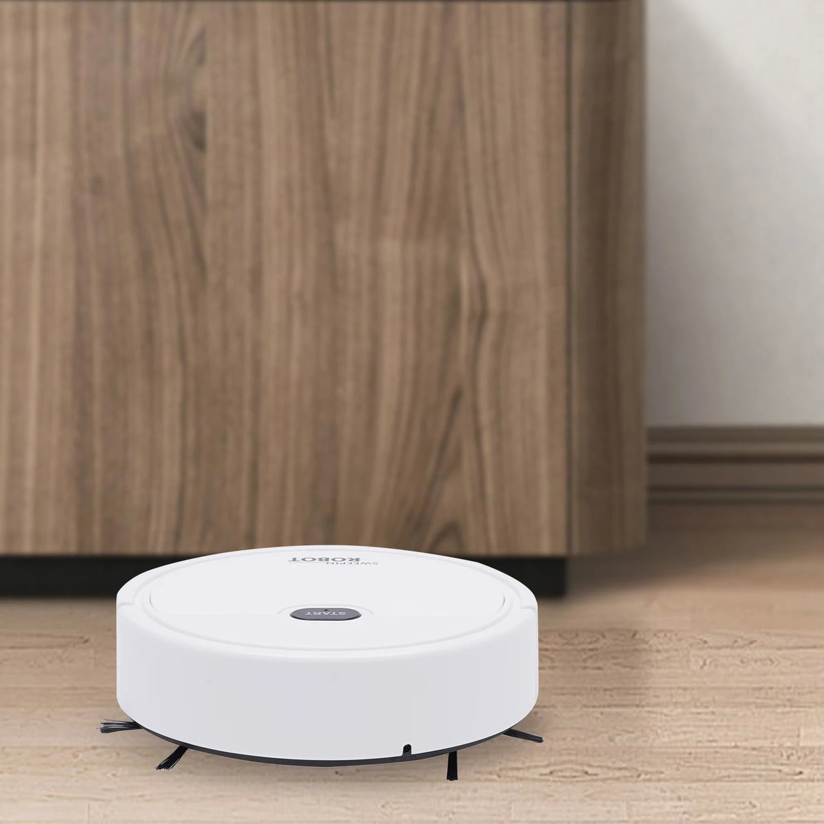 KT205 compact robot vacuum cleaner cleaning a wooden floor.
