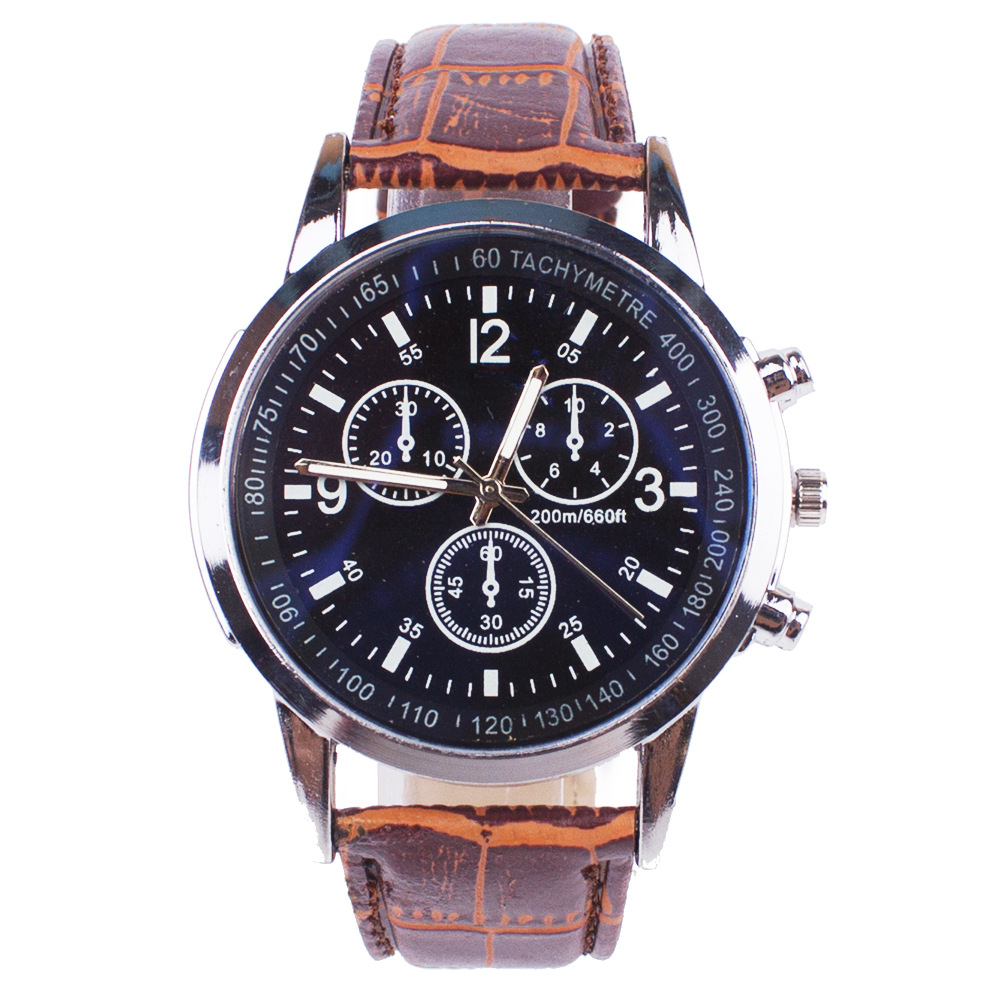 Men's quartz watch blue dial brown leather strap chronograph style close up.
